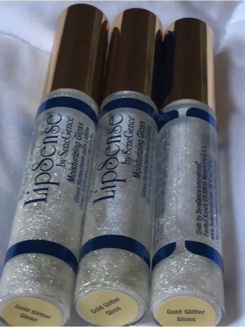 Lipsense by Senegence. Shade: Gold Glitter Gloss. NWT.